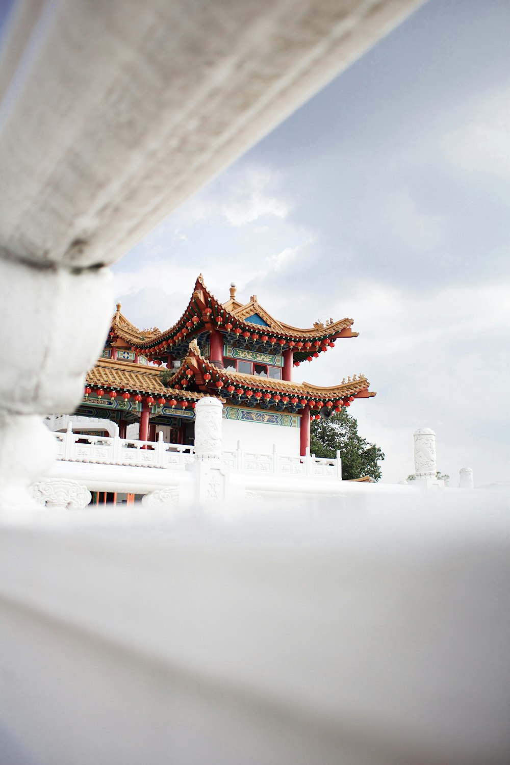 red and white temple during daytime