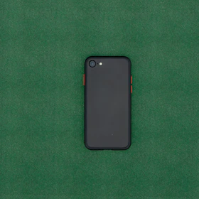 Hands testing speaker and microphone functionality on a Tecno smartphone.