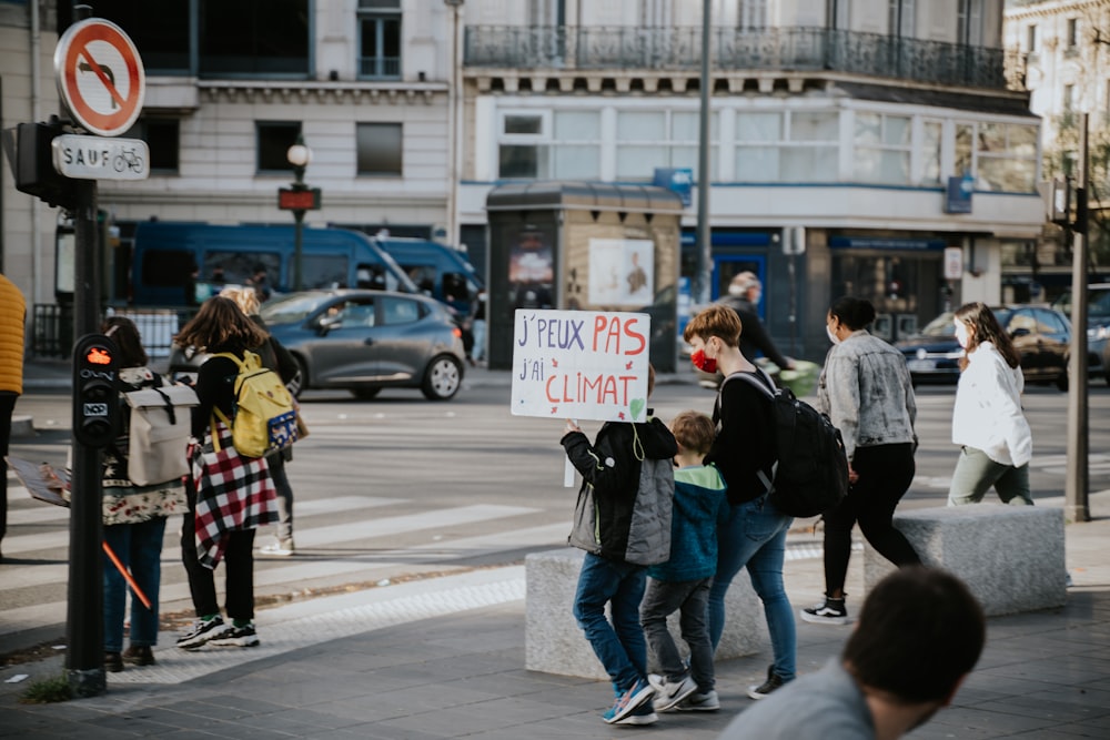 people walking on pedestrian lane during daytime