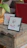 Close-up of a custom illustration framed elegantly beside a chic event table setting.