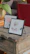 Close-up of a custom illustration framed elegantly beside a chic event table setting.