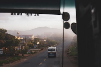 A scenic morning route showing a school bus driving through a quiet neighborhood.