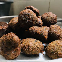 Close-up of traditional Palestinian food served near Masjidil Aqsa.