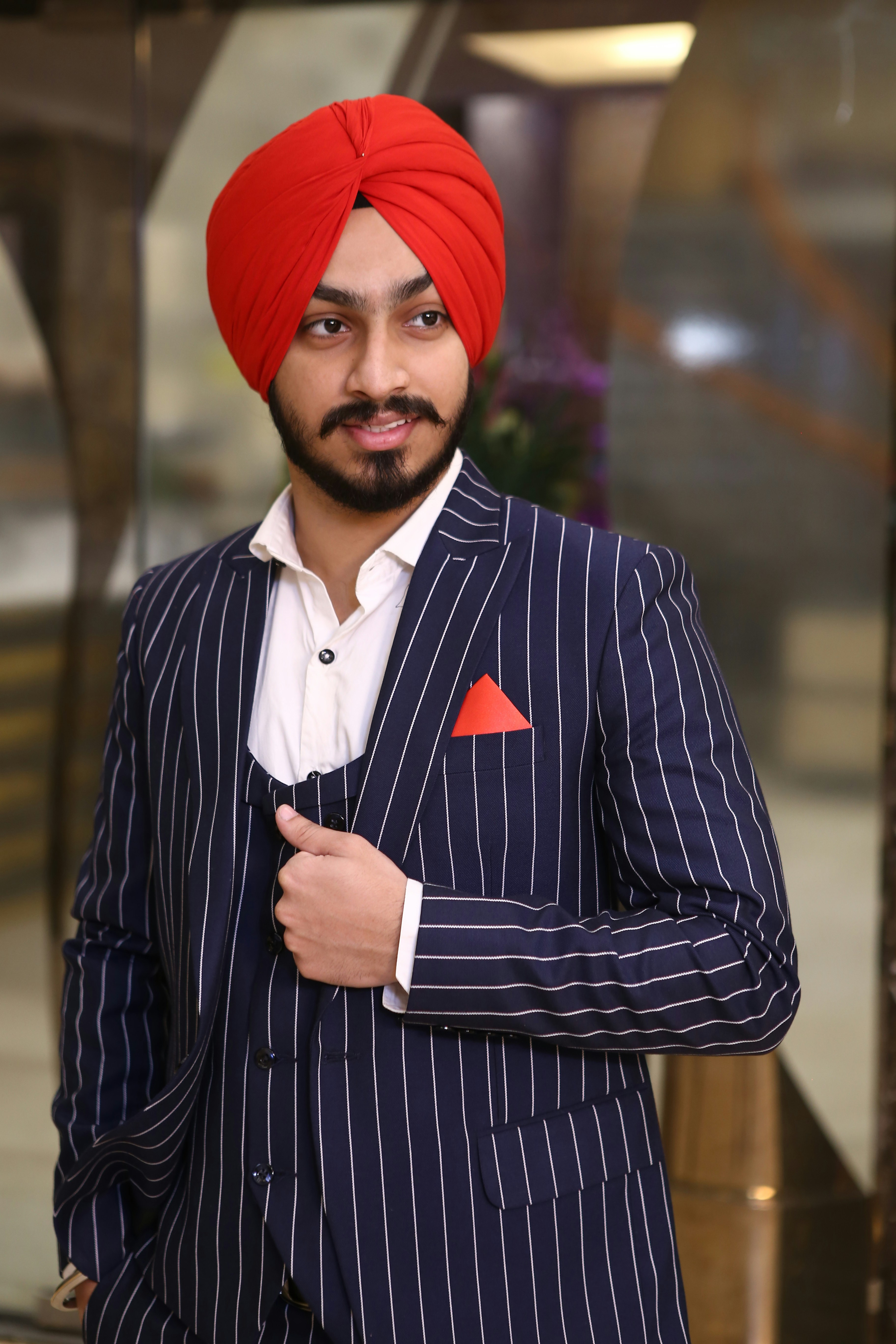 white striped suit jacket wearing 