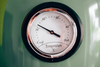 black and white analog clock at 10 00