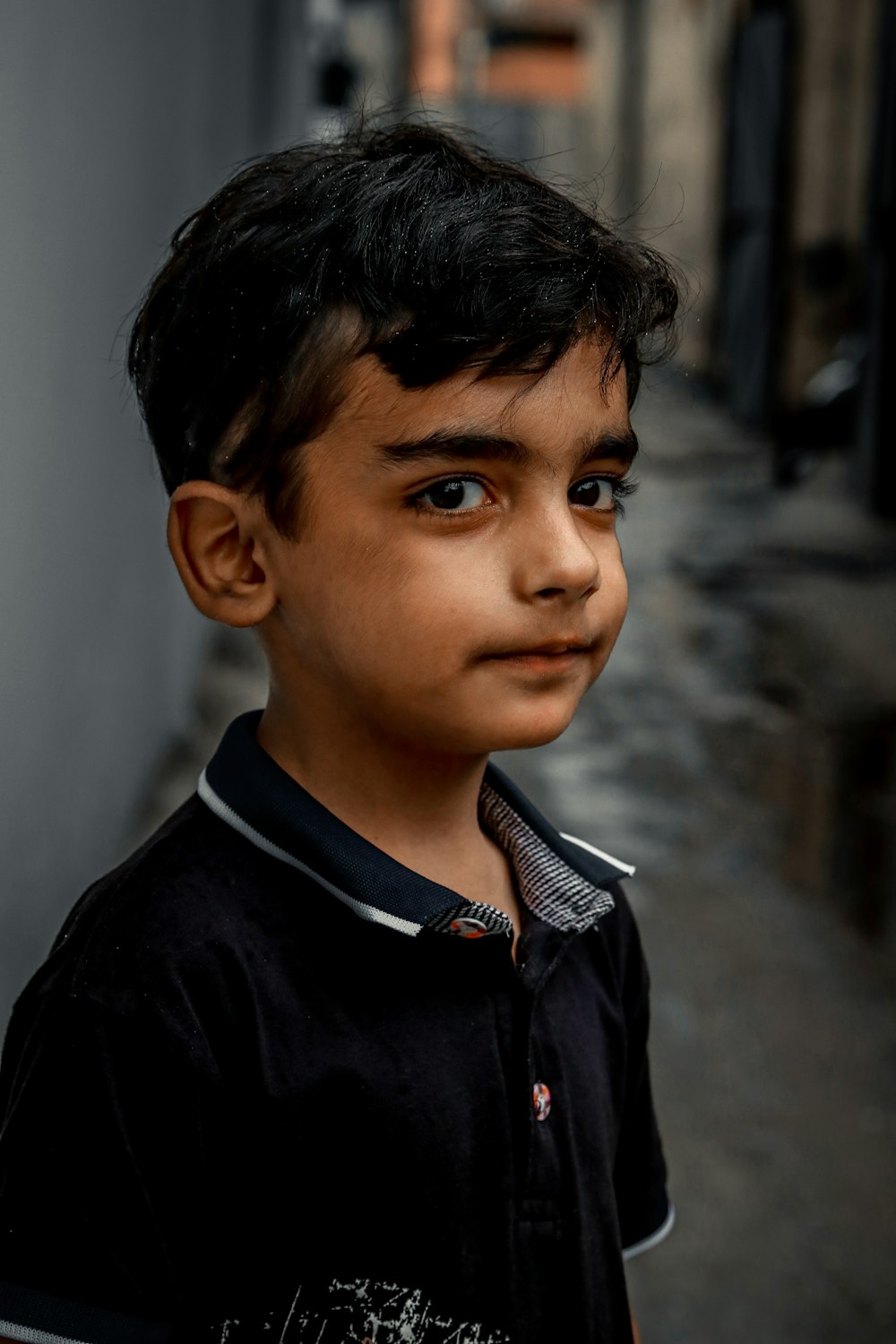 boy in black button up shirt