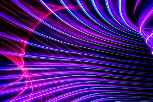 Vibrant neon lines forming a dynamic wave pattern for the third release.