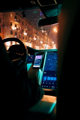 black and gray car interior with navigation dashboard