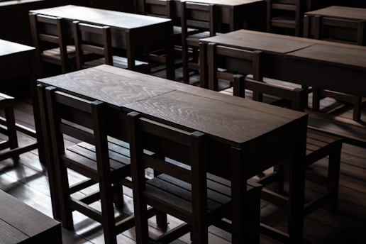 brown wooden table and chairs
