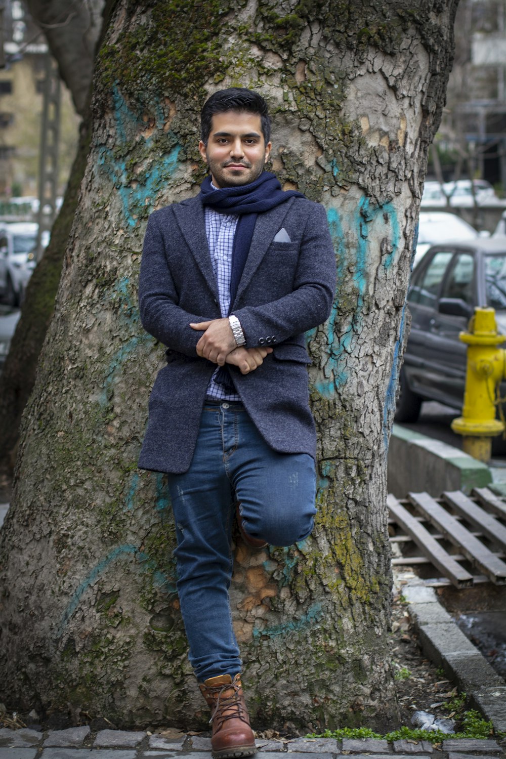 Man in blue suit jacket and blue denim jeans leaning on tree photo – Free  Apparel Image on Unsplash
