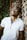 man in white button up shirt wearing black framed eyeglasses