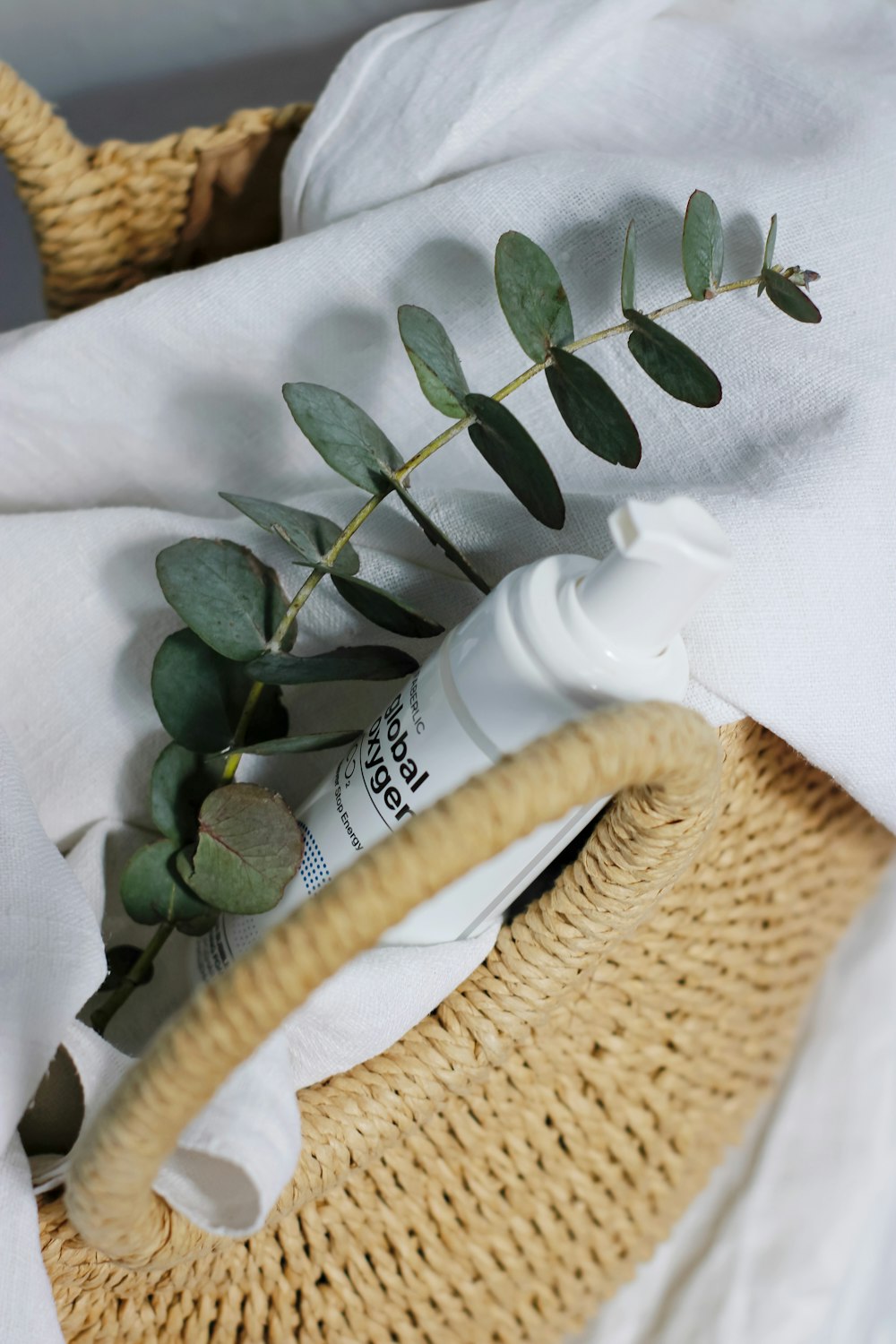 green plant on white textile