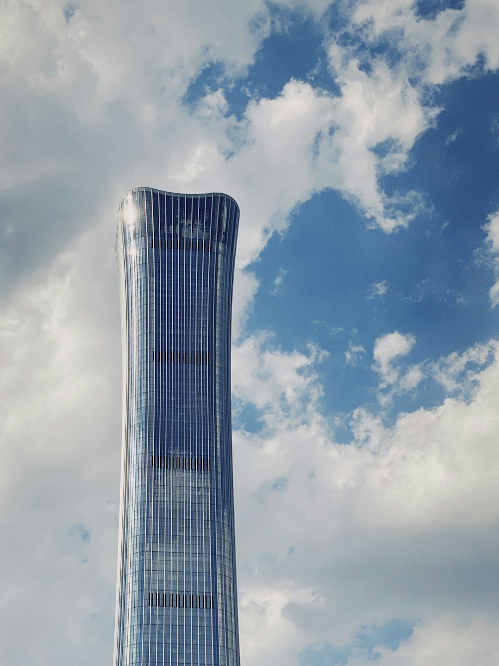 blue and white building under blue sky