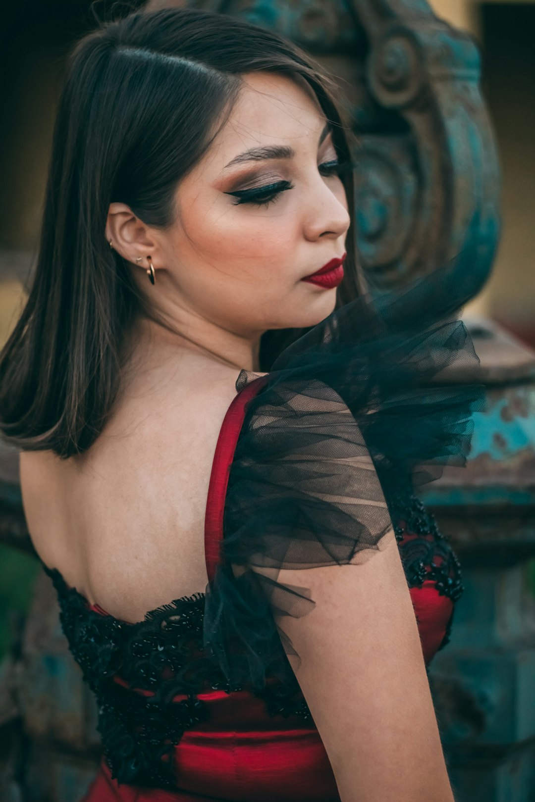 woman in black and red tank top