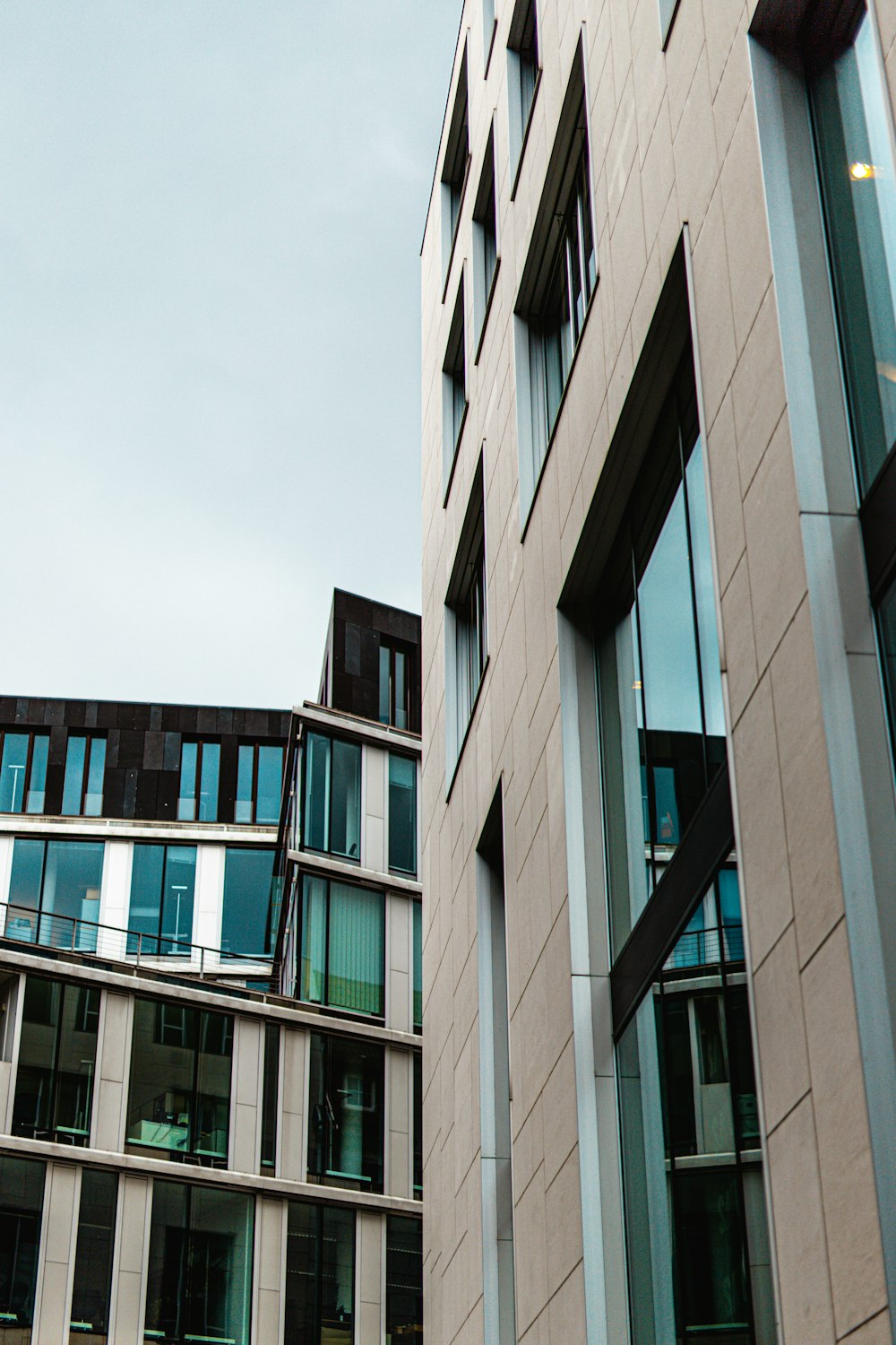 gray concrete building under white sky during daytime