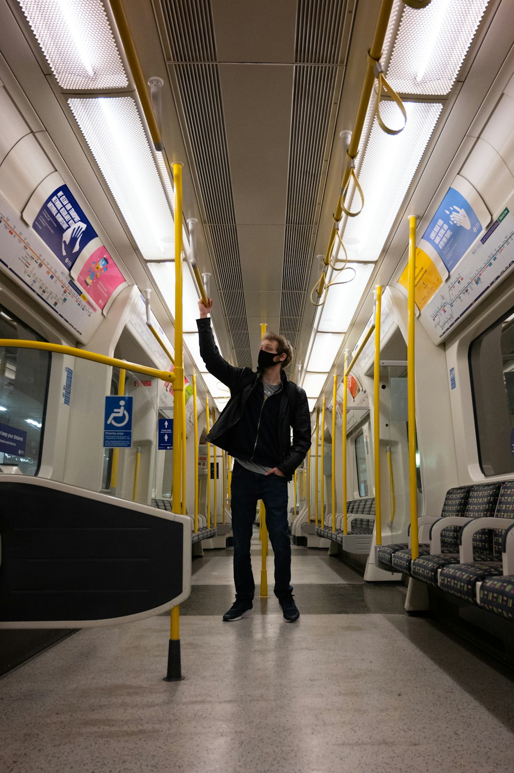 a person standing in front of a subway station