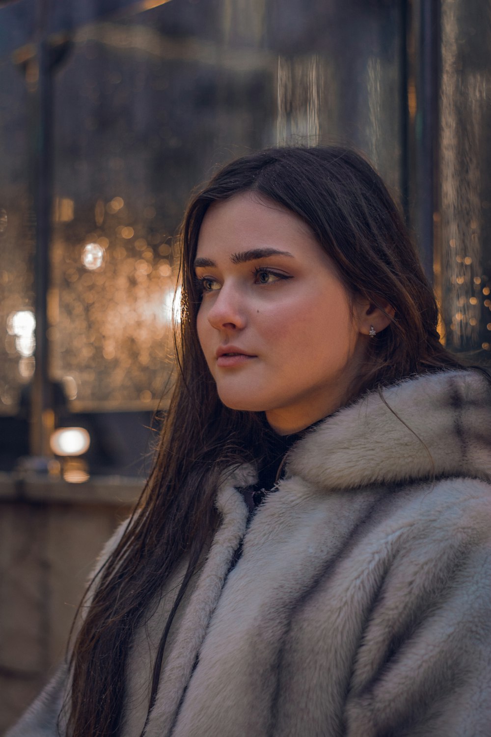 woman in white fur coat