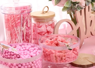 pink and white wicker basket with pink flowers