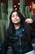 woman in black leather jacket
