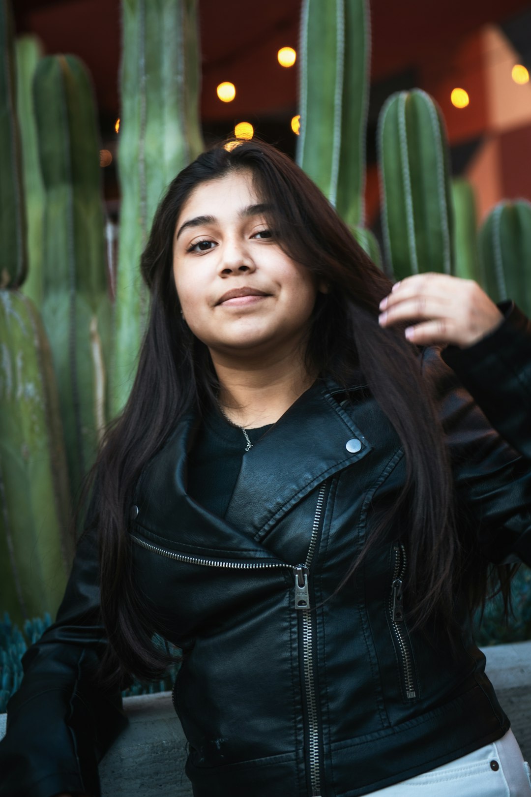 woman in black leather jacket