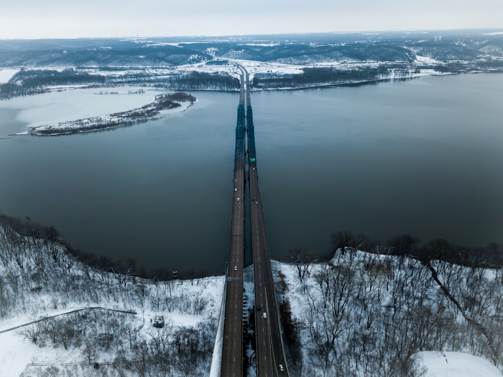 aerial view of bridge on body of water during daytime
