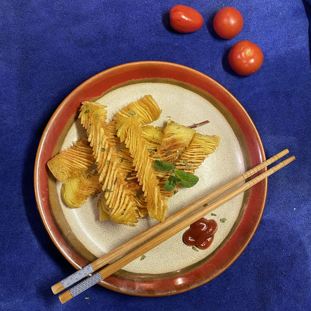 pasta on white and blue ceramic plate