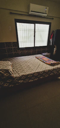 Comfortable bedroom in an affordable social housing property in Mexico