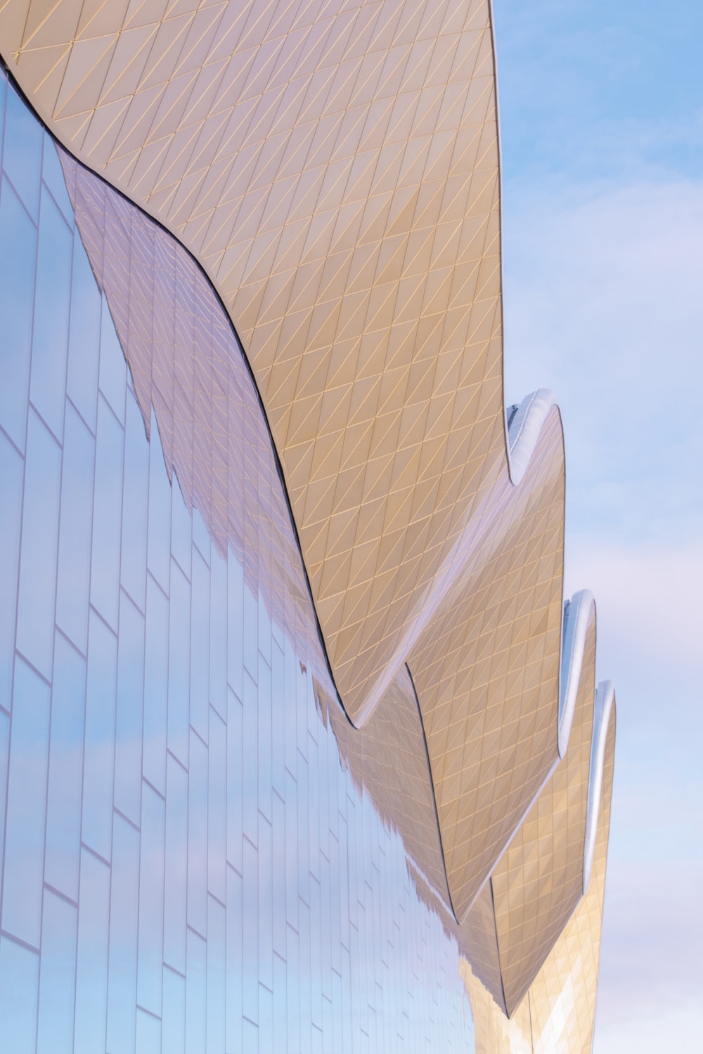 brown concrete building under blue sky during daytime