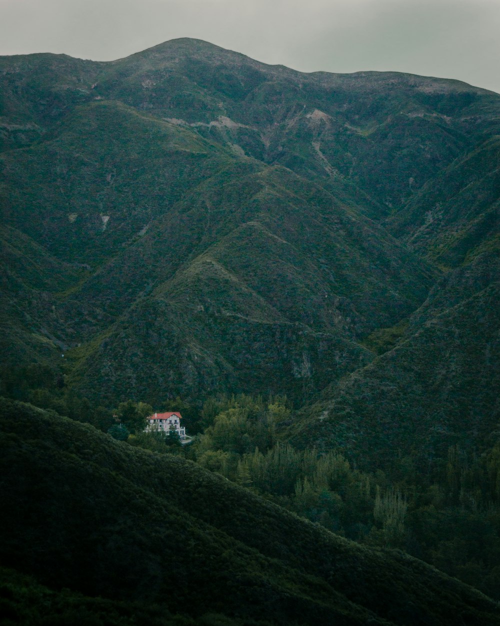 green mountains under white sky during daytime