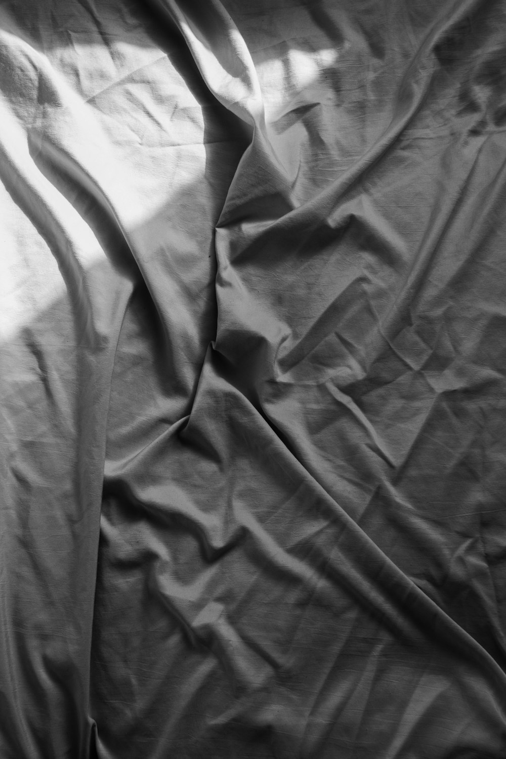 gray textile on white textile
