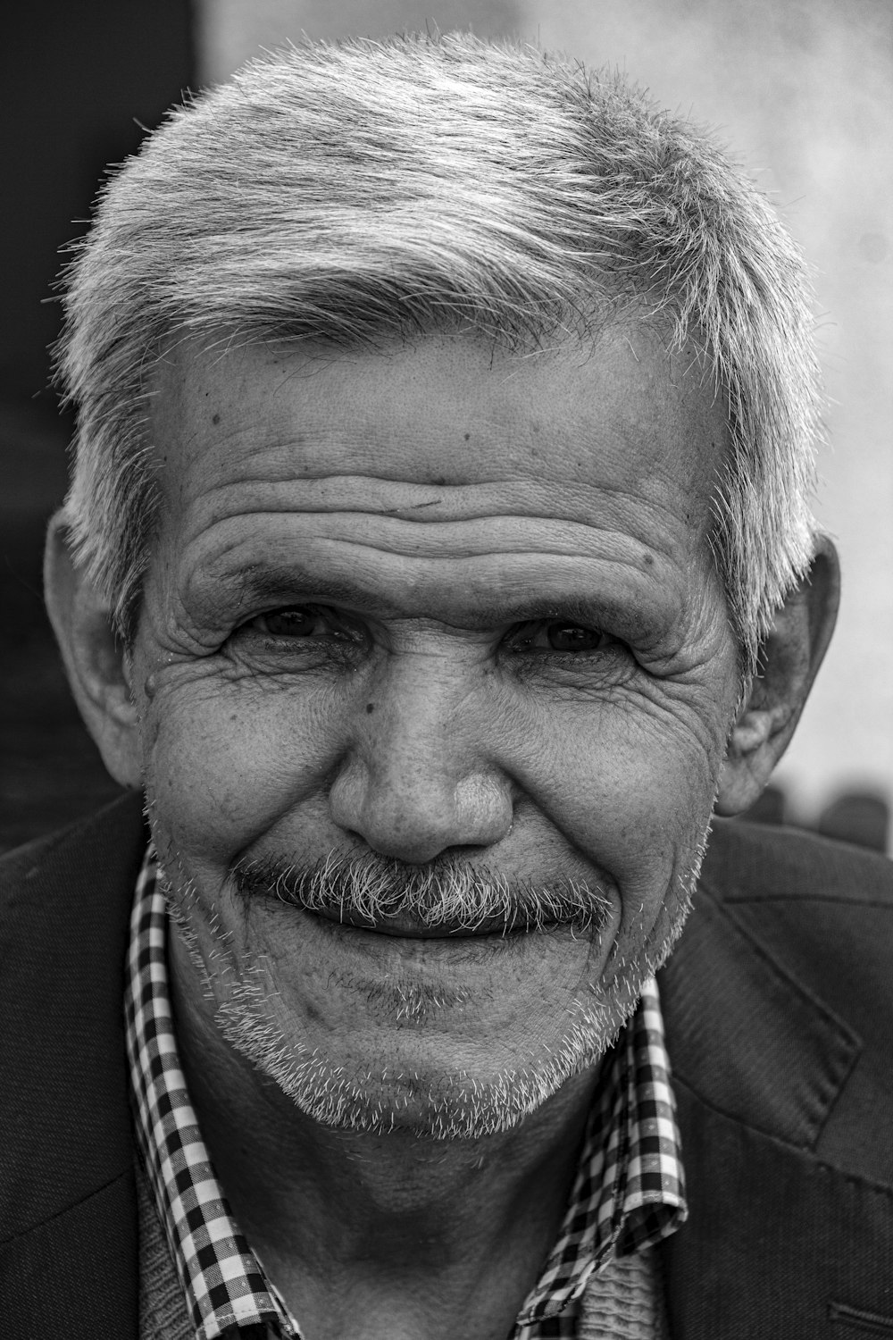 man in black and white shirt