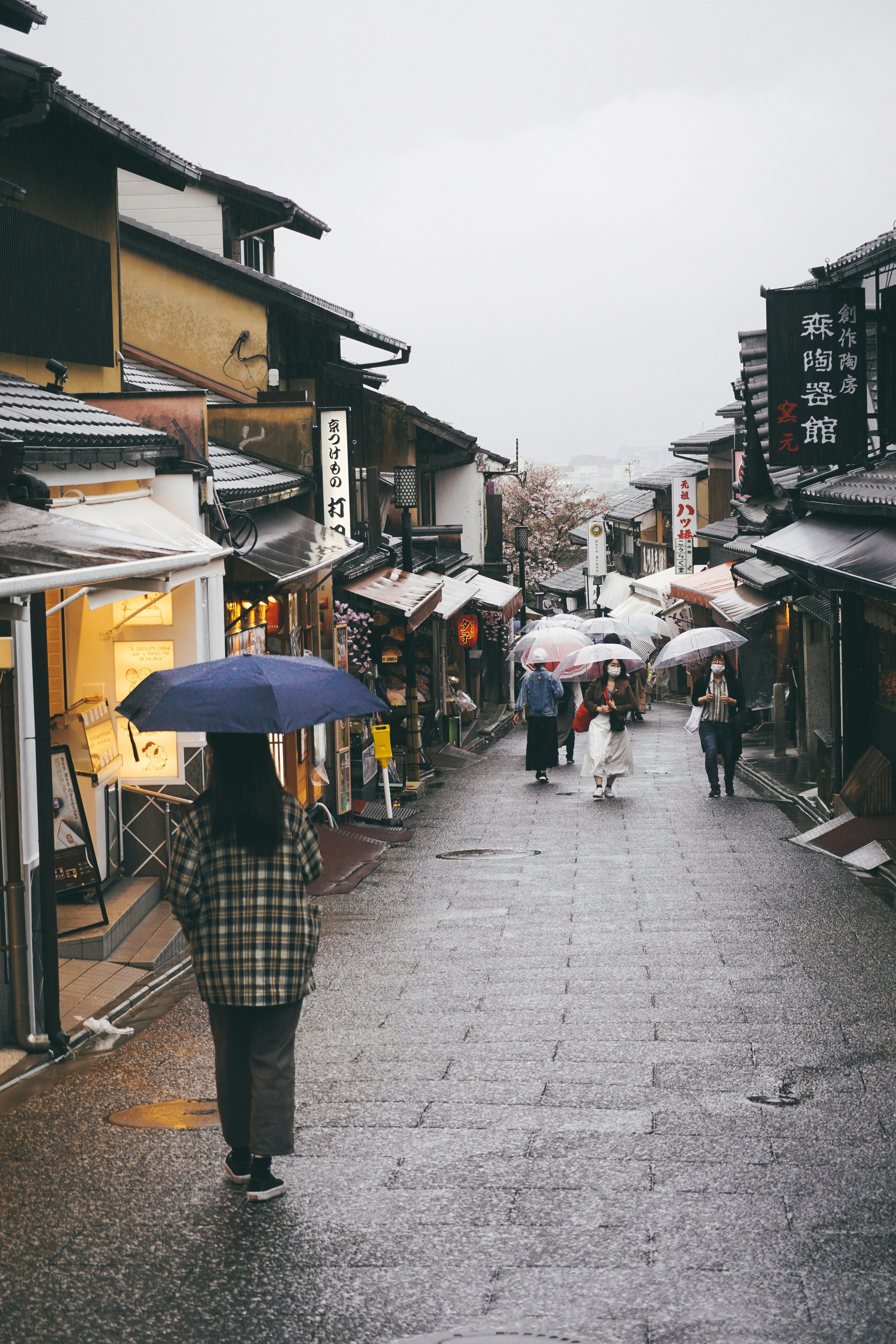 People Walking On Sidewalk With Umbrella During Daytime Photo Free Kyoto Image On Unsplash