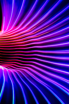 Vibrant neon gradient card showing a fast-paced ad automation dashboard in action.