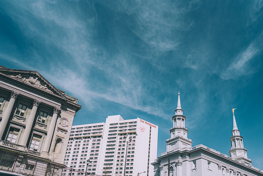 white concrete building under blue sky during daytime