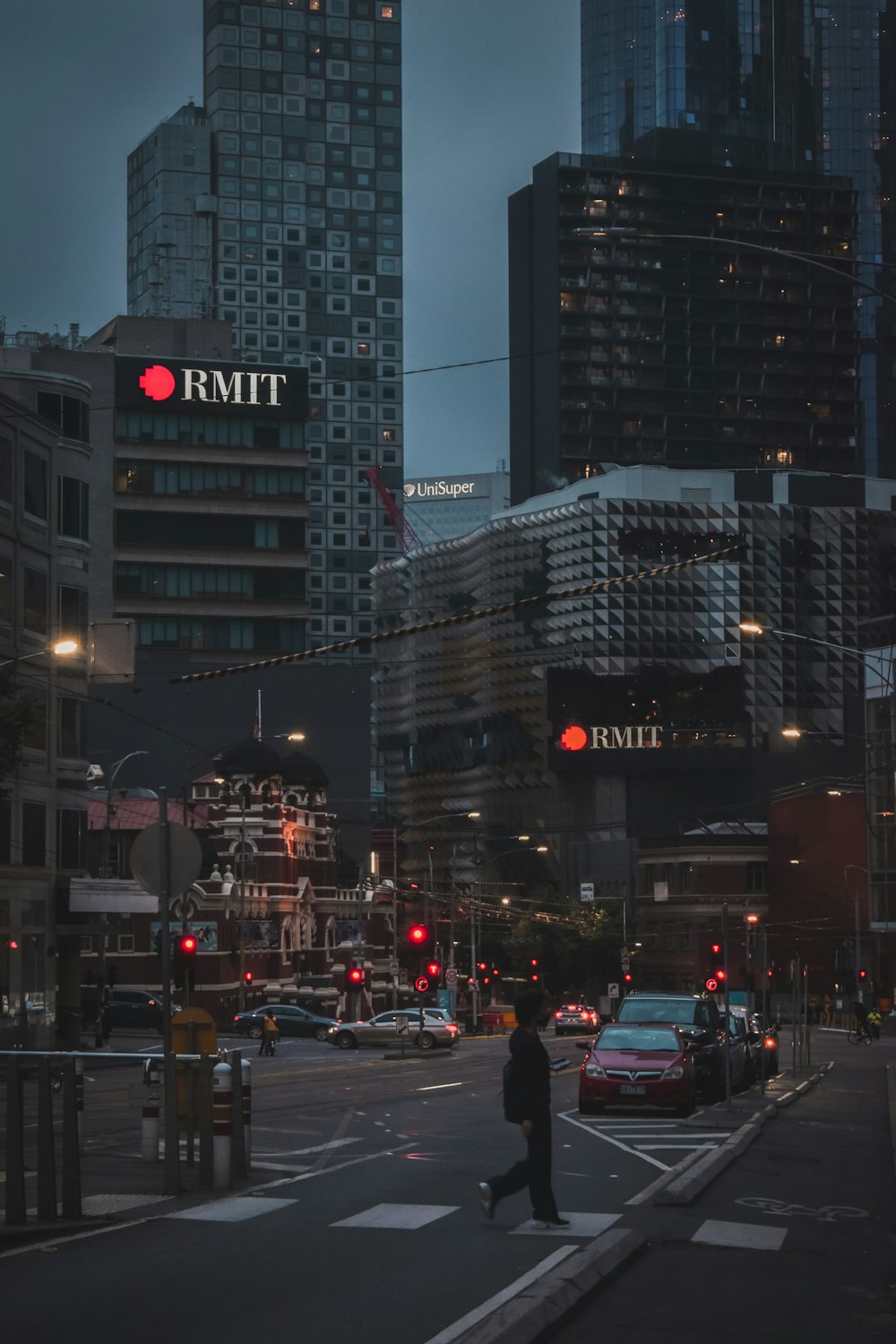 cars on road in city during night time