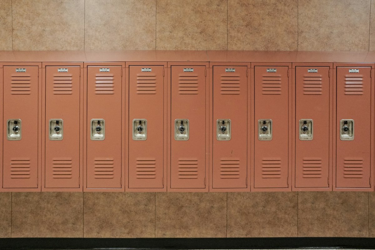 A row of school lockers with built-in combination dials