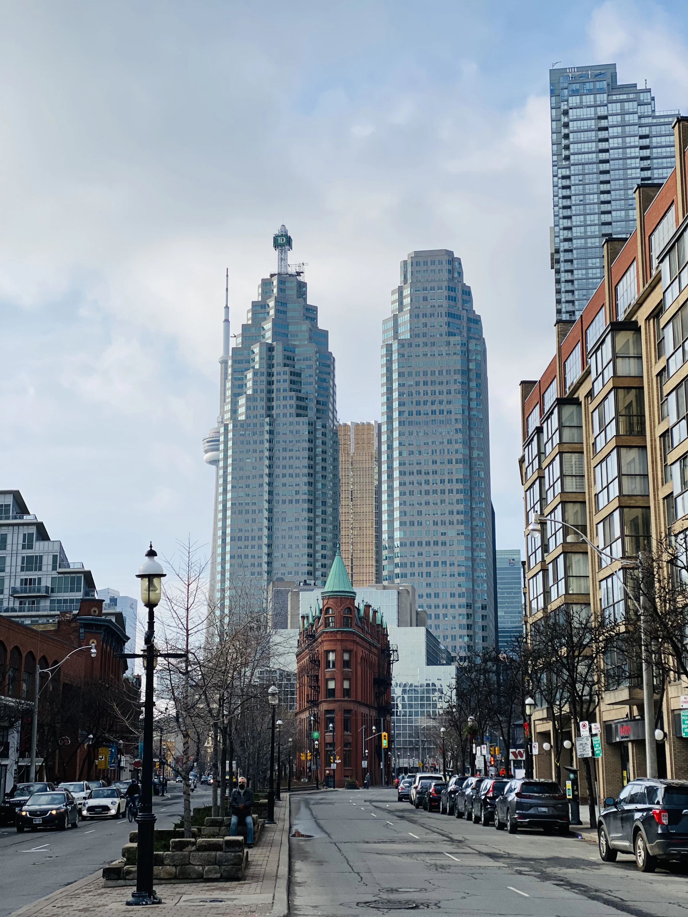 People walking among office towers in downtown Toronto