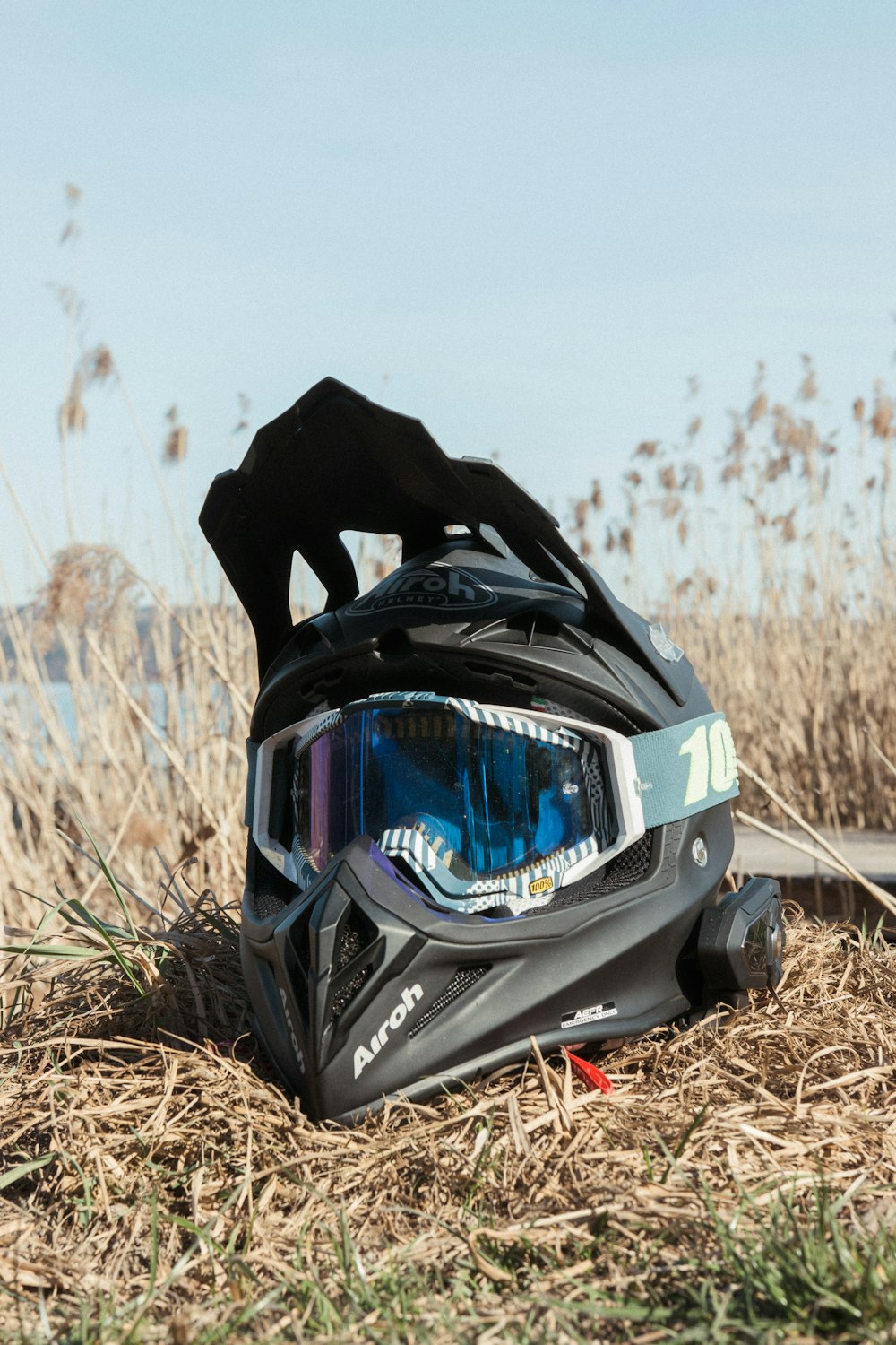 black and gray sports bike on brown grass field during daytime