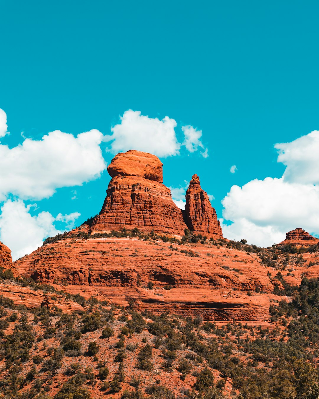 brown rock formation under blue sky during daytime