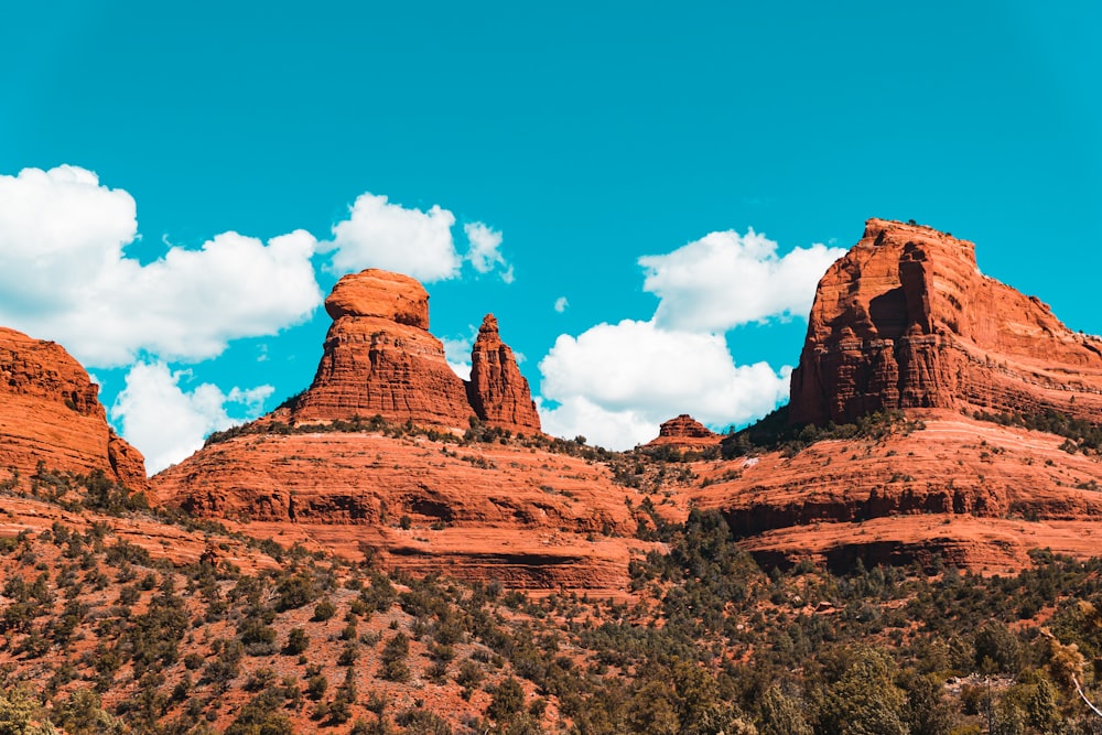 brown rock formation under blue sky during daytime