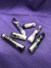 Close-up of polished amethyst stones ready for shipment.