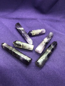 Close-up of polished amethyst stones ready for shipment.