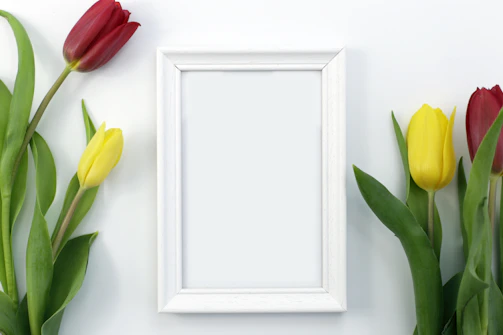 A custom wooden picture frame showcasing a child's first day of school photo with delicate hand-painted details.