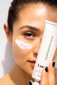 woman with white cream on face