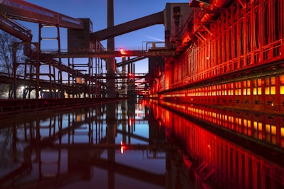 red and black bridge over water