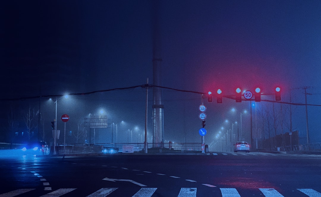 traffic light on red light during night time