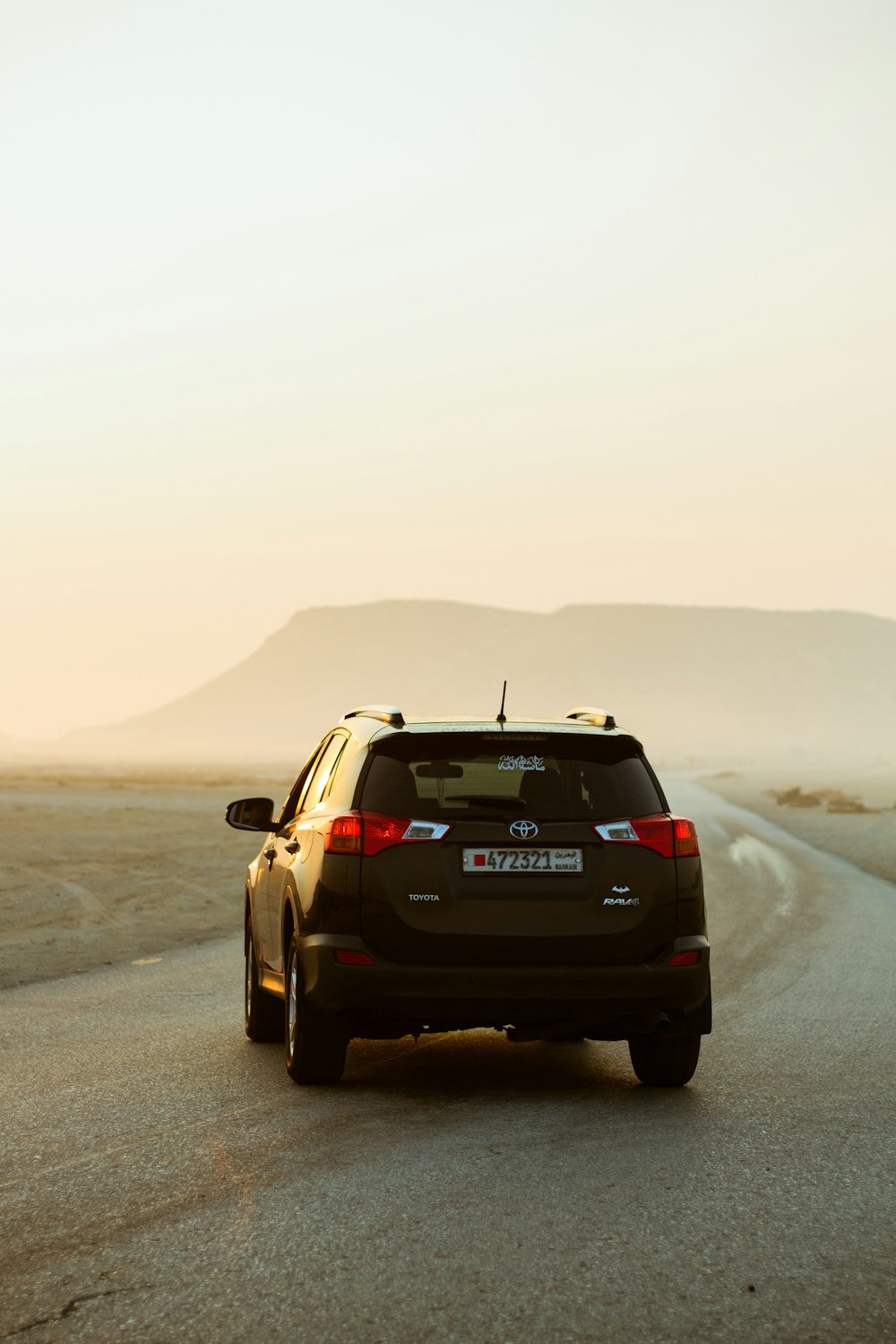 black honda car on road during daytime