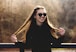 woman in black long sleeve shirt wearing black sunglasses