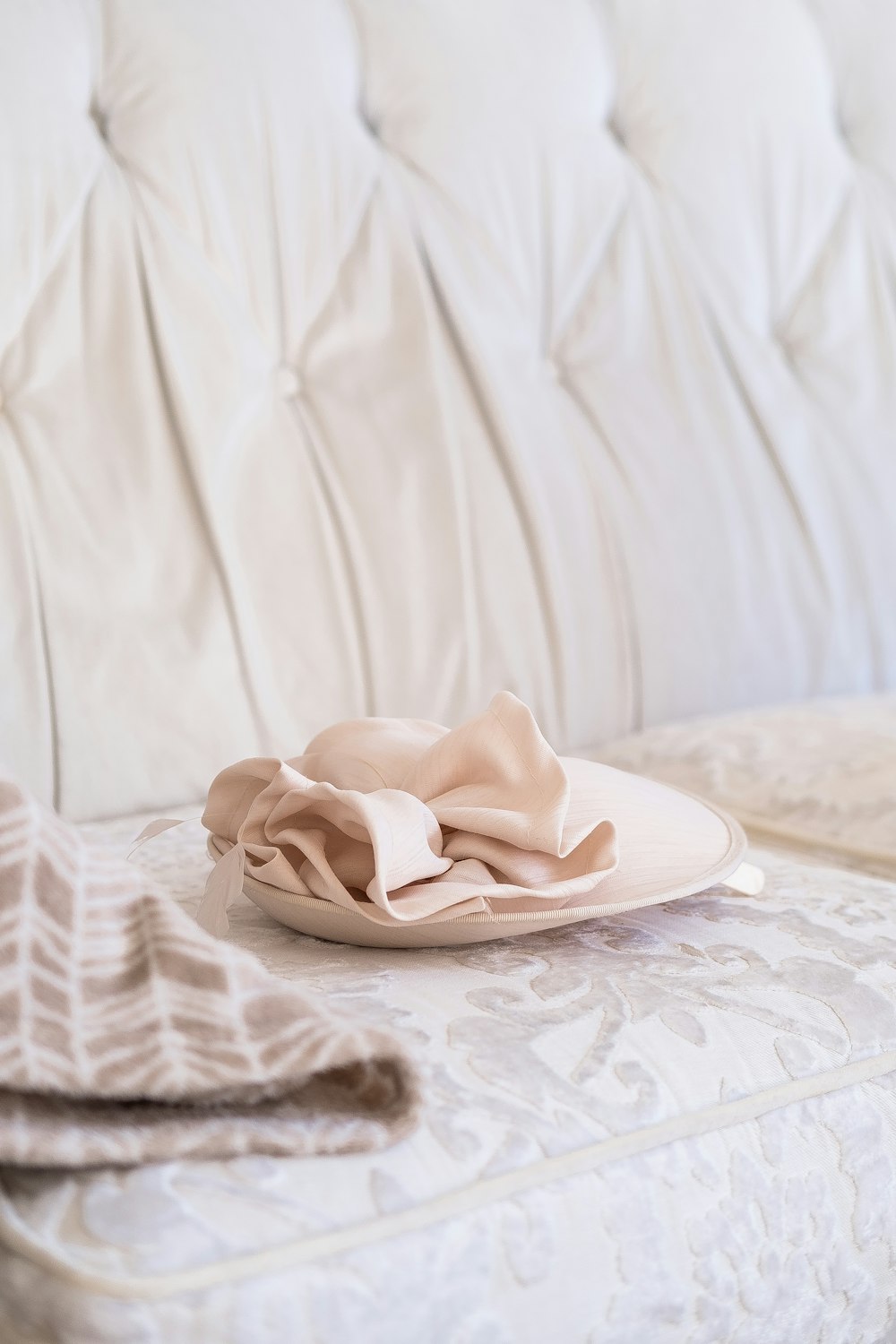 white textile on white ceramic plate