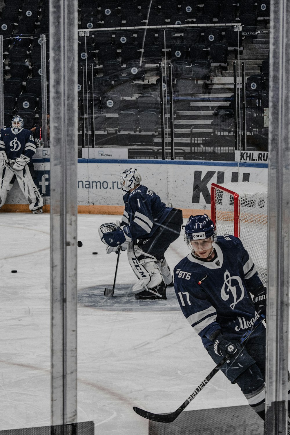 ice hockey players on ice hockey field